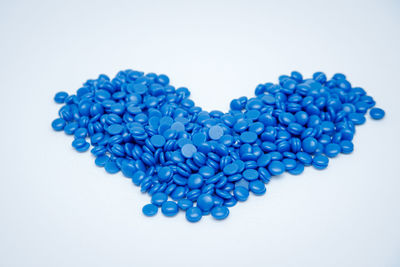 Close-up of heart shape against blue background