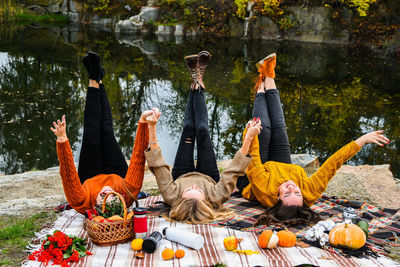 Group of people sitting by plants