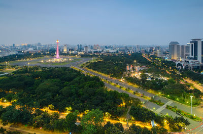 High angle view of buildings in city against sky