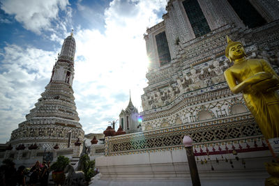 Low angle view of statue against sky