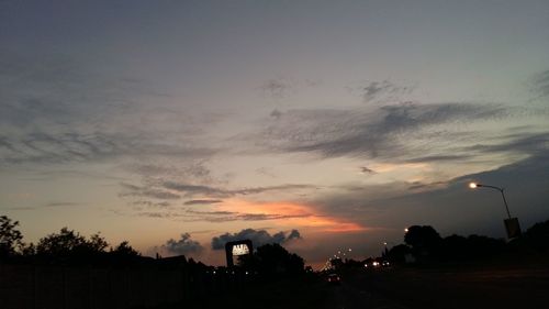 View of city against cloudy sky