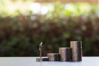 Stack of coins on table