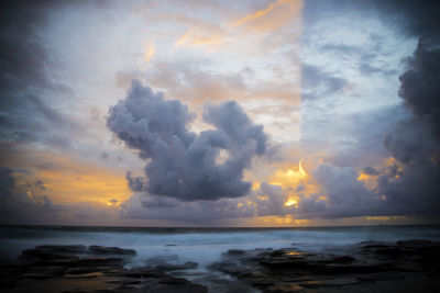 Scenic view of sea against dramatic sky