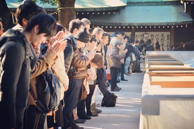 People praying at japanese temple