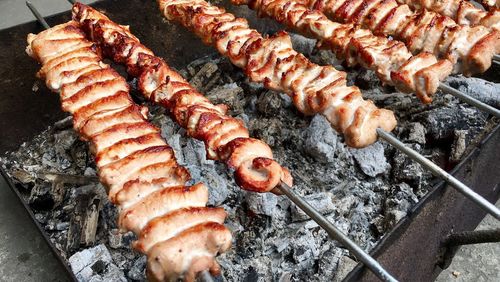 Close-up of meat on barbecue grill