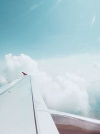 Low angle view of airplane flying in sky