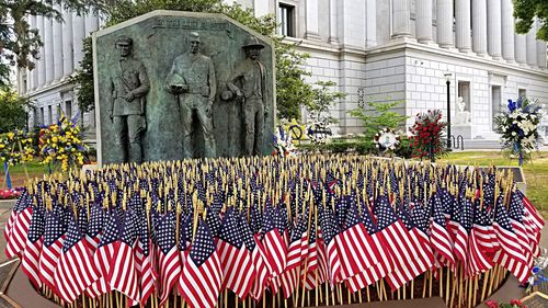 View of flags against built structure