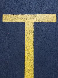 High angle view of alphabet on road