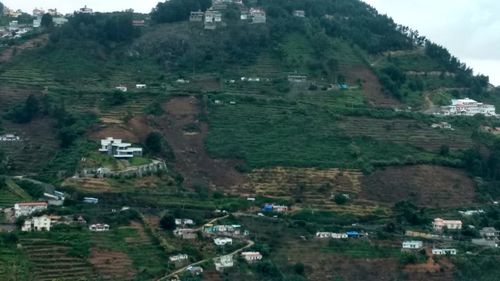 View of town against mountain range