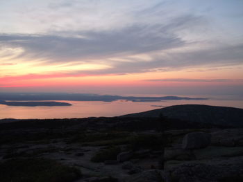 Scenic view of sea at sunset