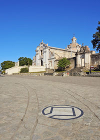 View of historical building against blue sky