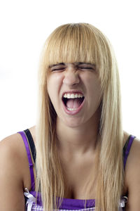 Portrait of a beautiful young woman over white background