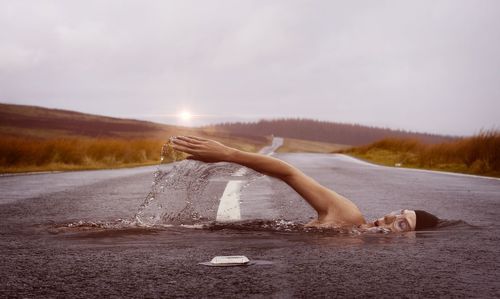 Rear view of woman in water