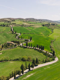 Scenic view of farm against sky