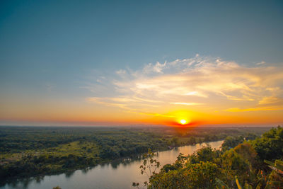 Scenic view of sunset over landscape