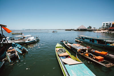 High angle view of boats moored in harbor