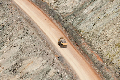 High angle view of truck on dirt road