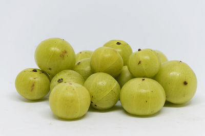 Close-up of apples on white background