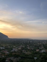 High angle view of townscape against sky during sunset