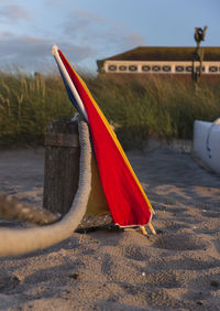 Close-up of beach against sky