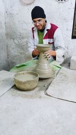 Man working on cutting board