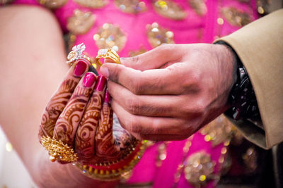 Close-up of woman holding hands