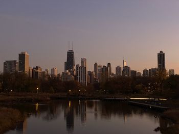 View of chicago skyline during sunset.