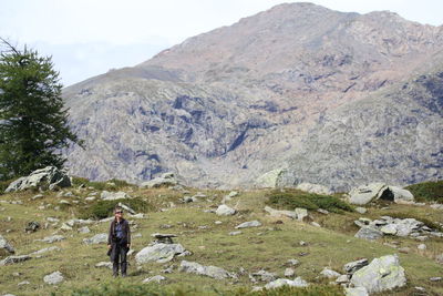 Woman standing on mountain