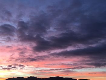 Scenic view of dramatic sky during sunset