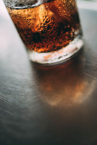 Close-up of beer glass on table