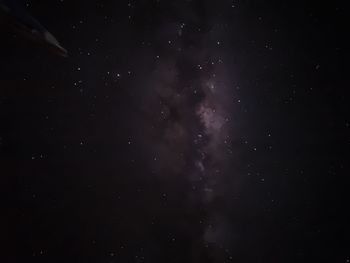 Low angle view of firework display at night