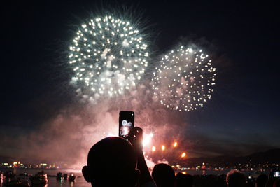 Firework display at night