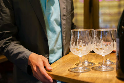 Midsection of businessman working at table