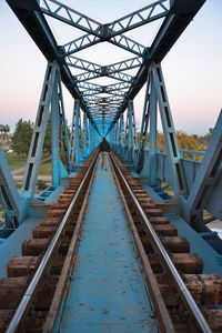 View of footbridge against clear sky