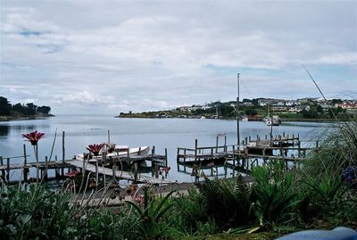 Boats moored at harbor