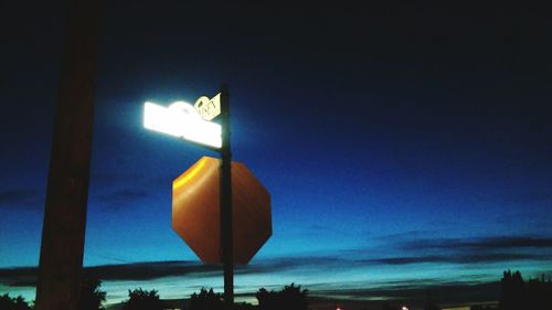 Low angle view of street light at night