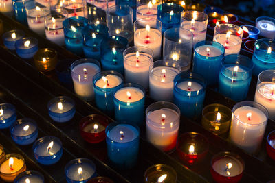 Lit candles in temple