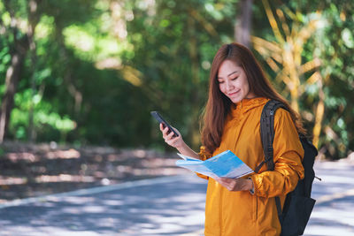 Young woman using mobile phone