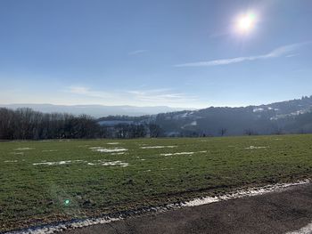 Scenic view of field against sky