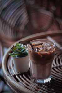 Close-up of coffee in glass on table