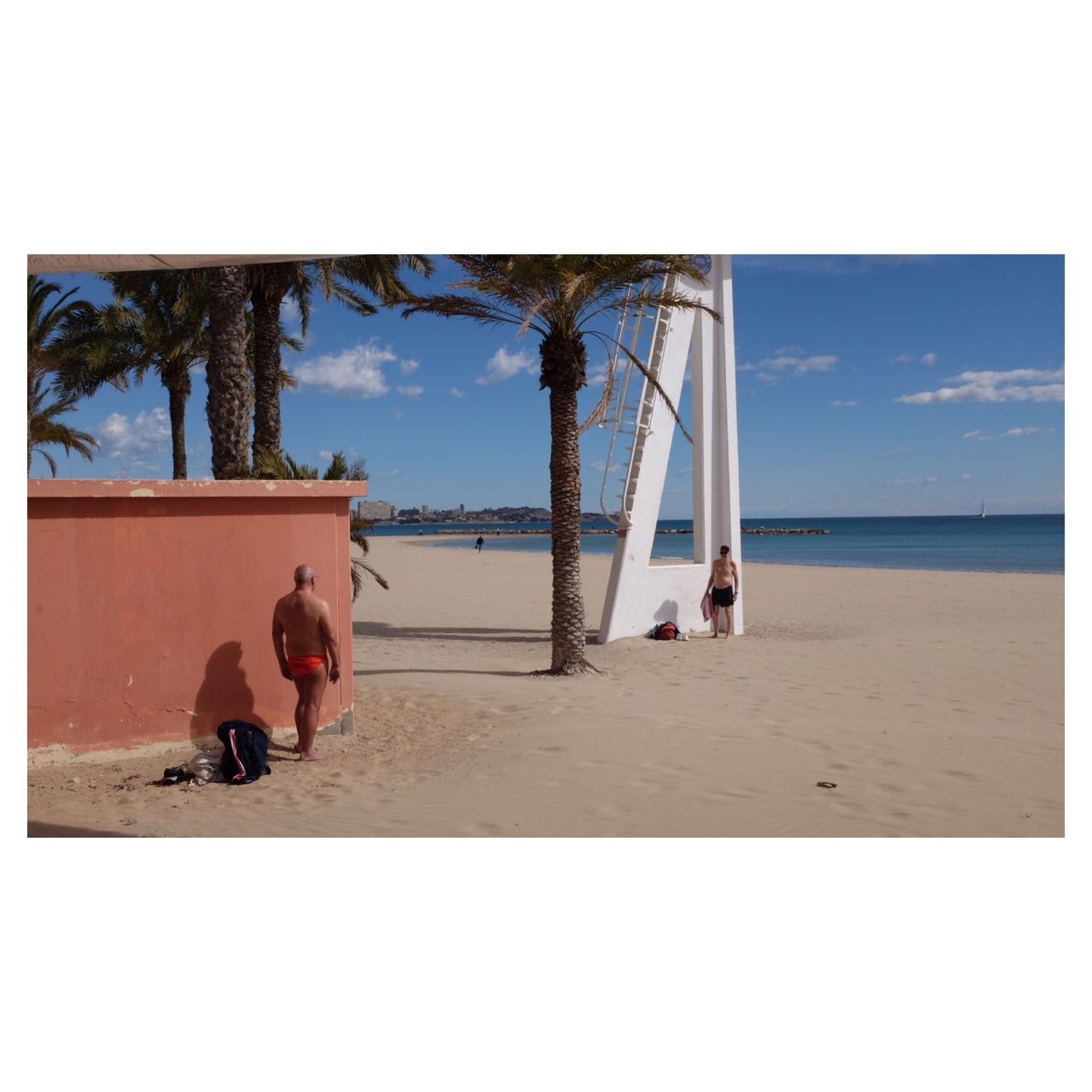 transfer print, sea, auto post production filter, sky, horizon over water, beach, water, men, lifestyles, leisure activity, built structure, person, shore, architecture, cloud - sky, outdoors, cloud, day, nature