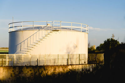 View of factory against sky