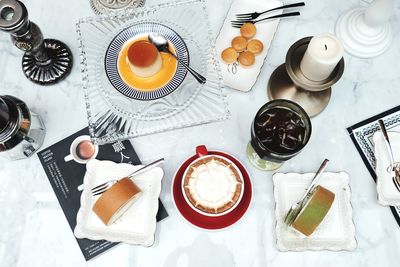 High angle view of coffee served on table