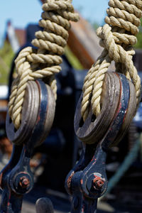 Close-up of rope tied up on pulley