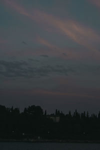 Silhouette of building at sunset
