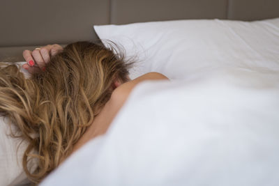 Woman sleeping in bed