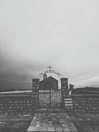 Gazebo in building against sky