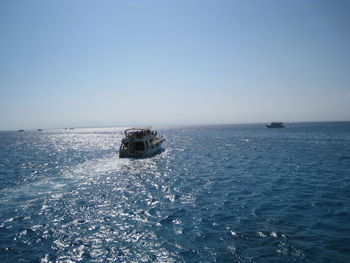 Boat sailing in sea