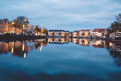 Reflection of illuminated buildings in water