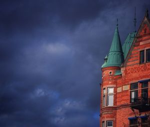 Low angle view of bell tower against sky